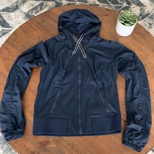 Lululemon Outdoor Navy Blue Hooded Jacket- Zip up and water resistant.